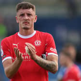 Reece Hutchinson acknowledges the Crewe fans