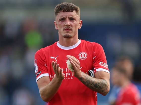 Reece Hutchinson acknowledges the Crewe fans