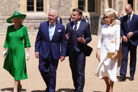 Queen Camilla, King Charles III, President of France Emmanuel Macron and his wife Brigitte Macron walk side by side at the Ceremonial Welcome for his state visit to the UK, at Windsor Castle in 2025