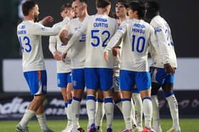 Lawrence Shankland (third left) celebrates the opening goal