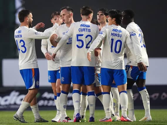 Lawrence Shankland (third left) celebrates the opening goal