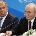 Sergei Lavrov and Vladimir Putin