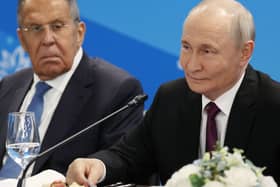 Sergei Lavrov and Vladimir Putin