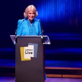 The Queen reads a letter as she takes part in a performance of Letters Live at the Royal Festival Hall