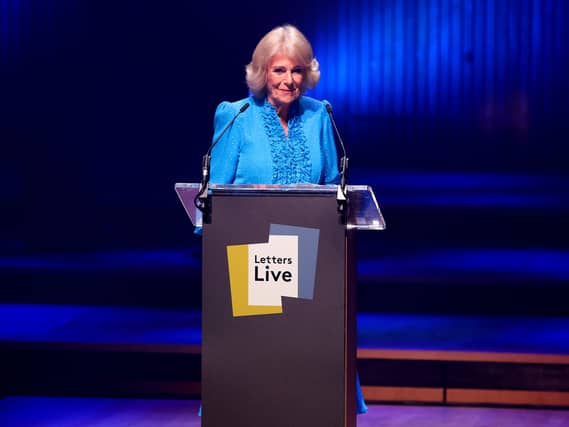 The Queen reads a letter as she takes part in a performance of Letters Live at the Royal Festival Hall