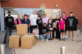 Elsa Layton-Jones' family with the Unspoken team members and nurses during the toy drop at Hereford Hospital