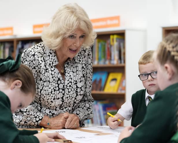 The Queen talks to local schoolchildren