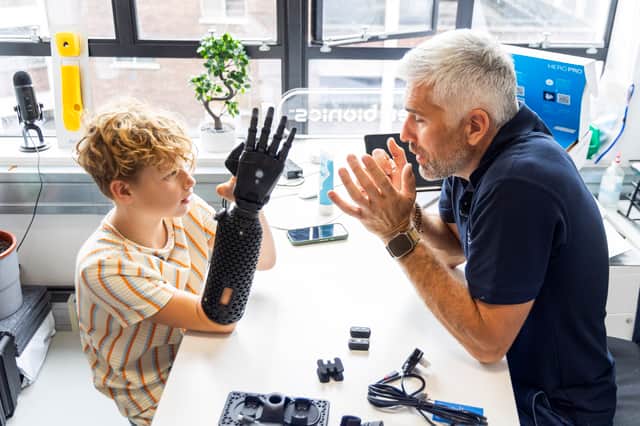 Fin Lawlor has received his new bionic arm in time for school