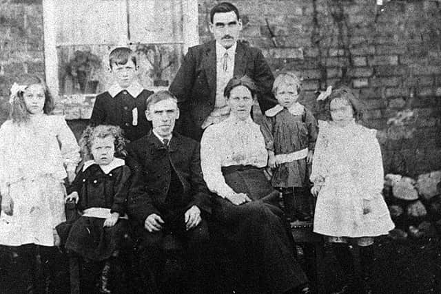 The Gough family outside 36 Dark Lane in about 1912. The photo came from Mrs Melville Rogers, daughter of Gladys Gough, the little girl far right.