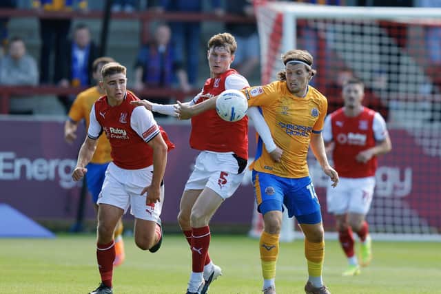 Josh Davison (right) in action for Shrewsbury Town against Fleetwood Town