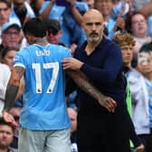 Manchester City midfielder Enzo Fernandez with manager Enzo Maresca