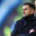 John Mousinho on the touchline