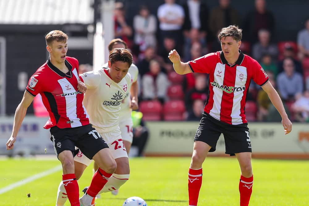 Lincoln and Southampton battle for the ball