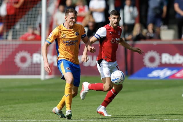 Shrewsbury Town suffered defeat at Fleetwood Town. Pictured: Captain Will Boyle (left)