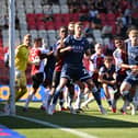 Action from Walsall's goalless draw at Exeter City