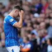 Lawrence Shankland leaves the pitch injured