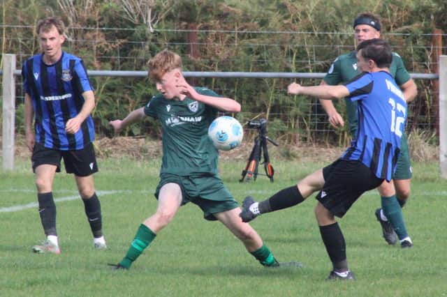Goalmouth action from Radnor Valley's clash with Hakin United