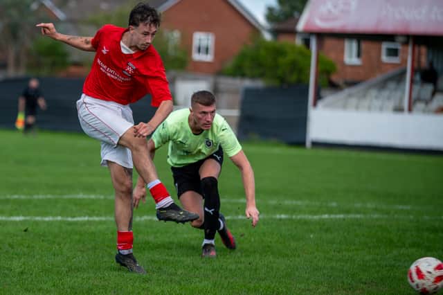 Luke Mason scores for Whitchurch Alport 1946 against FC Nations Picture: Liam Pritchard
