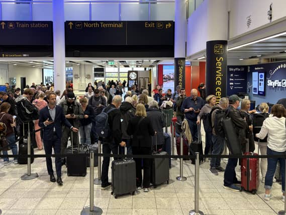 Passengers queue at airports as flights are delayed or cancelled