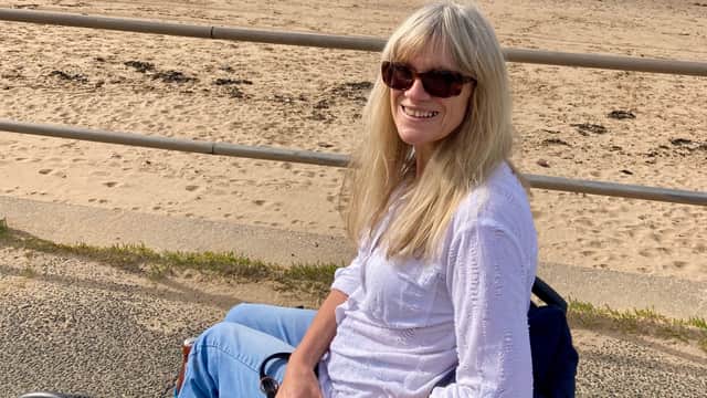 Miranda Jenks, 61, from Oswestry is taking on a 90ft abseil and one-mile canoe for Spinal Injuries Association