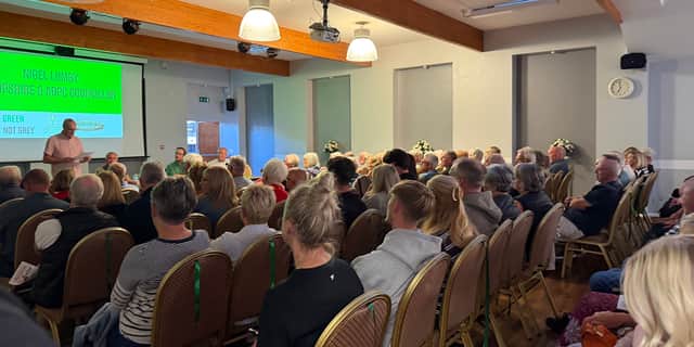The packed meeting last week