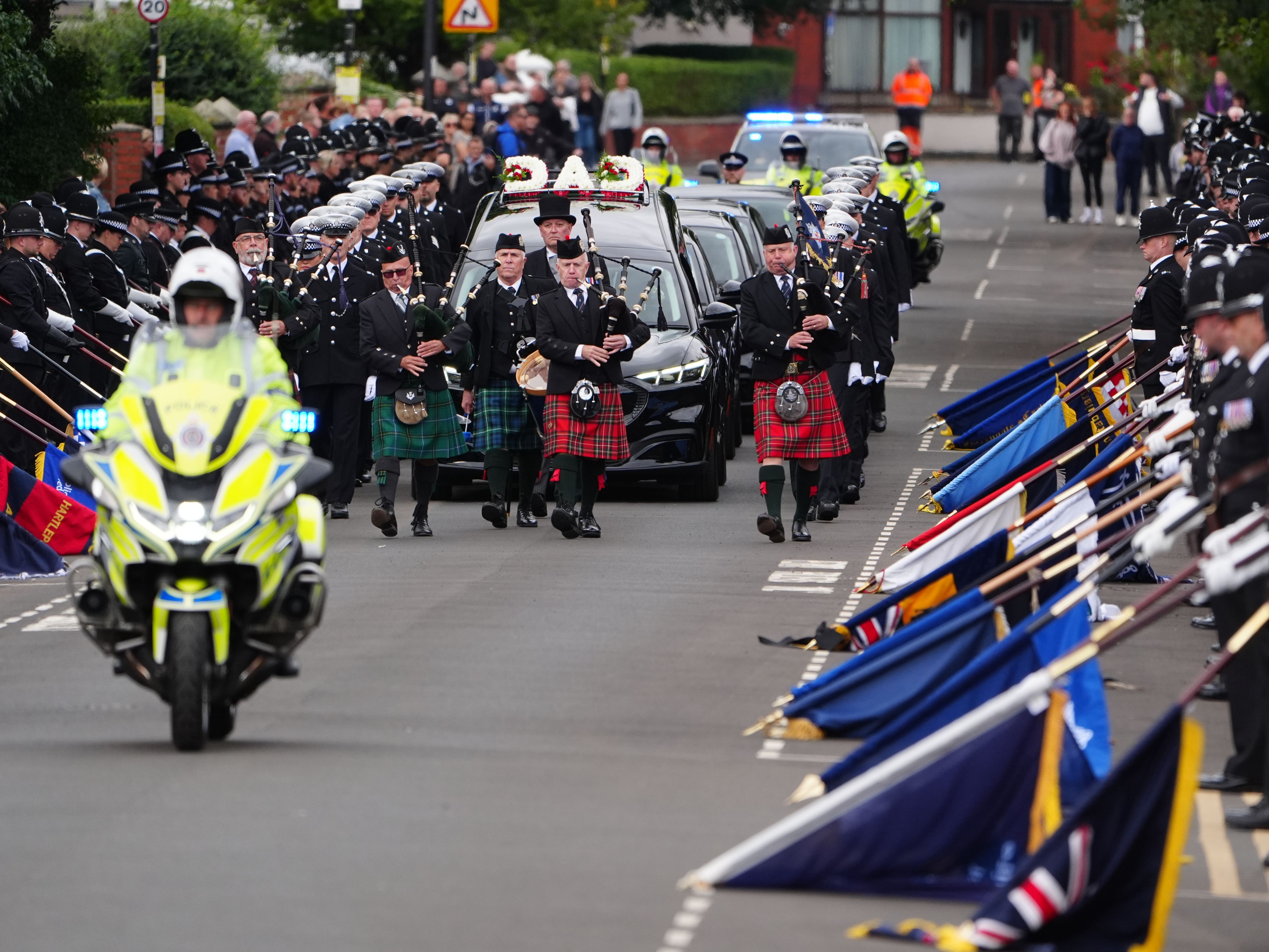 Hundreds of police line street at A66 crash colleague’s funeral