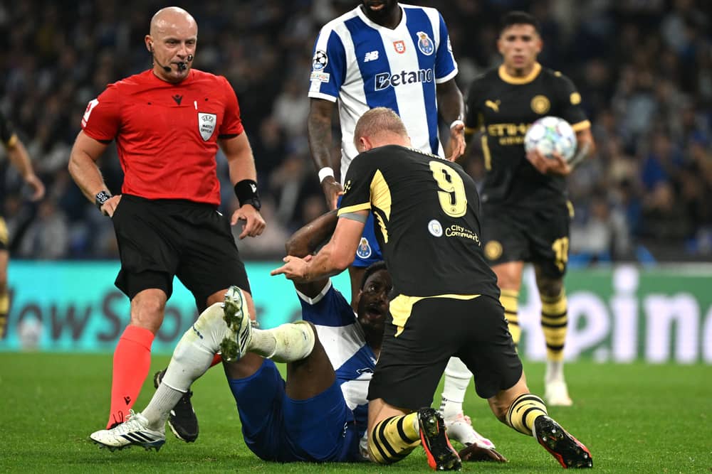 Manchester City’s Erling Haaland (right) and Porto’s Pablo Rosario clash after a challenge during Tuesday's Champions League match at the Estadio do Dragao