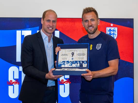 The Prince of Wales makes a presentation to Harry Kane