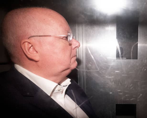 Peter Murrell pictured in the back of a prison van