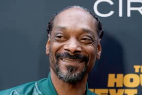 Snoop Dogg poses at the premiere of The House Next Door: Meet The Blacks 2 on June 7, 2021, in Los Angeles