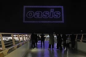 A drone light show over the Joie Stadium football ground at the Etihad Campus in Manchester