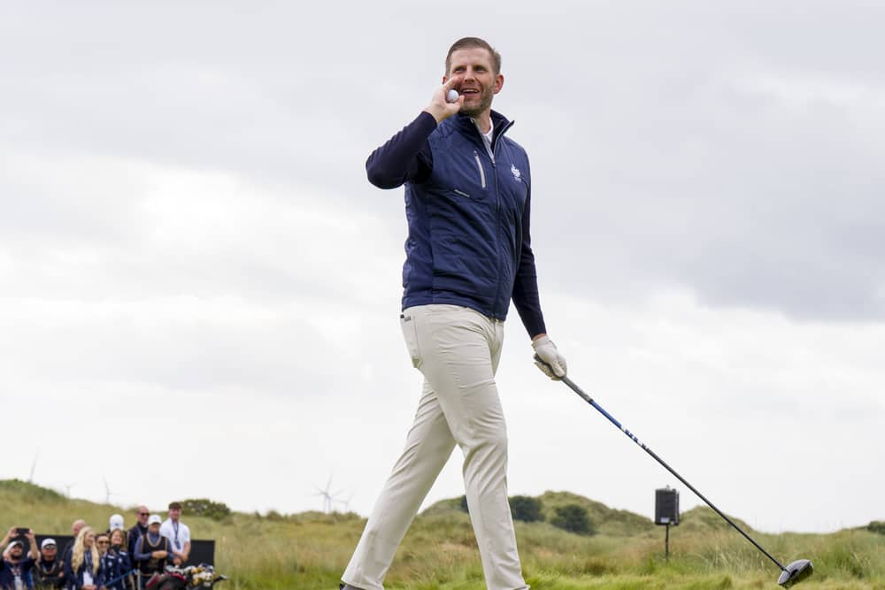 Eric Trump playing golf