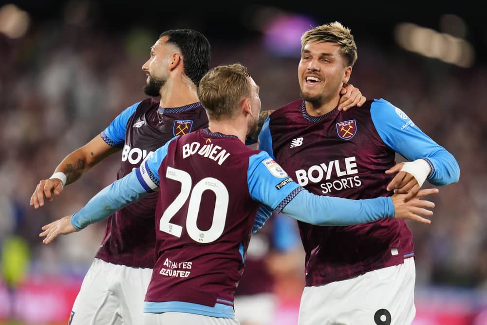 Joel Piroe, right, Taty Castellanos, left, and Jarrod Bowen celebrate