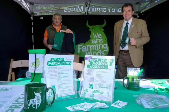 Volunteers Fred Walsh and Neil Wright on the We Are Farming Minds stand at Kington Show. They were fundraising and promoting the charity which helps farmers with poor mental health and works to reduce the stigma of mental health.