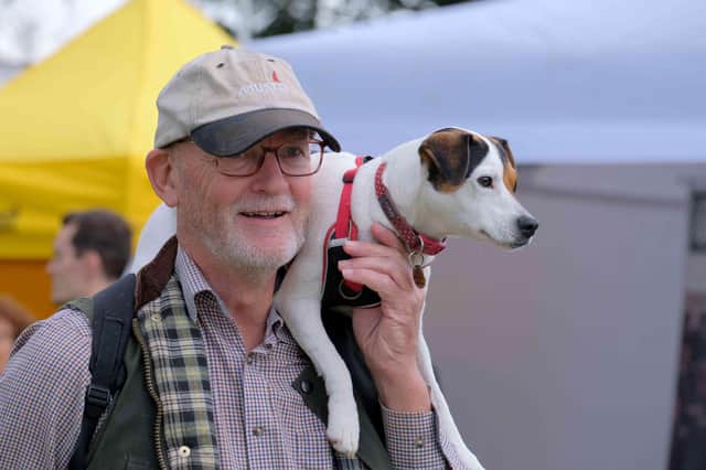 Mabel, an almost two year old terrier, was a bit nervous of the big show crowds and sought refuge on the shoulders of owner Richard Tandy from Yarpole.