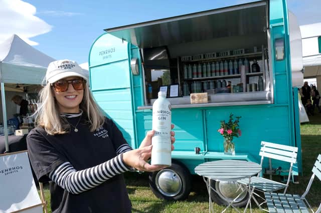 Harriet Evans of Penrhos Gin was at the company's gin bar at Kington Show. The neighbours of the showground had a limited supply of 250 bottles of wonky blueberry gin which they created using their one million blueberries from their farm. Once they are gone, they are gone
As well as serving drinks during the day, people could also buy bottles and gift packs.