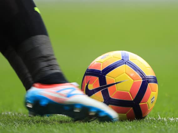 A general view of a Nike AerowTrac machtball being kicked