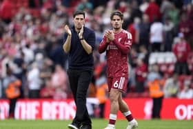 Liverpool manager Andoni Iraola and Milos Kerkez applaud the Liverpool fans (