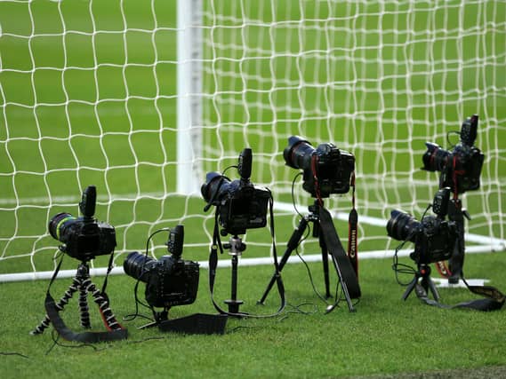 Remote cameras positioned behind the goal