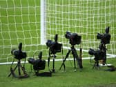 Remote cameras positioned behind the goal