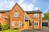 The detached Hatchetts Close property sits within a quiet residential setting