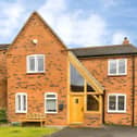 The detached Hatchetts Close property sits within a quiet residential setting