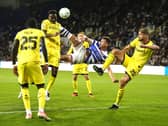 Reading’s Paudie O’Connor, centre, scores with a bicycle kick before the goal is ruled out