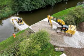 On Wednesday morning, contractors were busy building another dam along with Llangollen Canal in Whitchurch in order to drain a stretch of the canal and investigate the issue