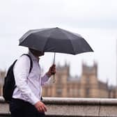 Man holding an umbrella
