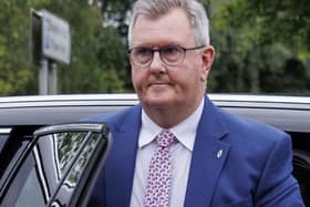 Jeffrey Donaldson exiting a car