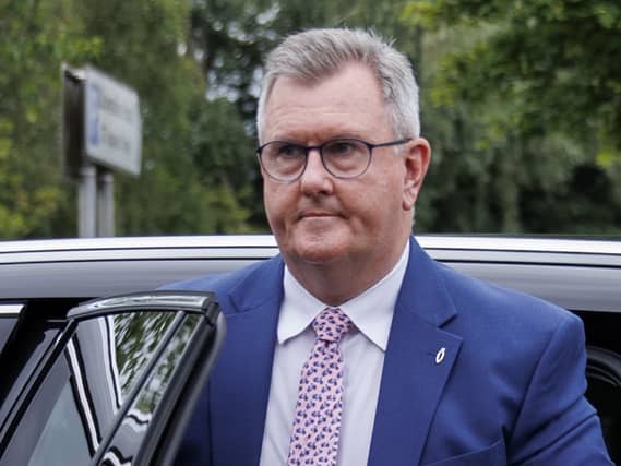 Jeffrey Donaldson exiting a car