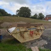 The large mound of earth and space used to store construction equipment which was supposed to be ‘green space’.