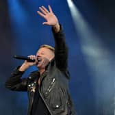 Macklemore performing at Leeds Festival