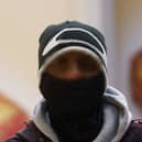 A male wearing a face covering in the centre of Nottingham